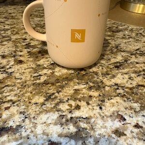 Nespresso Beige Mug with Yellow Logo